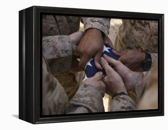 Marines Fold an American Flag after It was Raised in Memory of a Fallen Soldier-Stocktrek Images-Framed Premier Image Canvas