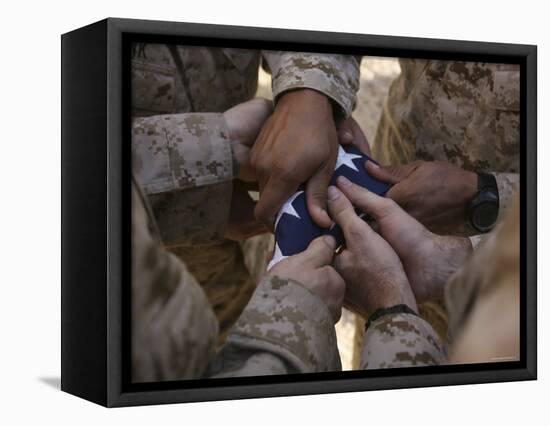 Marines Fold an American Flag after It was Raised in Memory of a Fallen Soldier-Stocktrek Images-Framed Premier Image Canvas