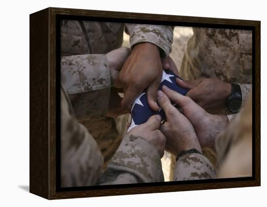 Marines Fold an American Flag after It was Raised in Memory of a Fallen Soldier-Stocktrek Images-Framed Premier Image Canvas