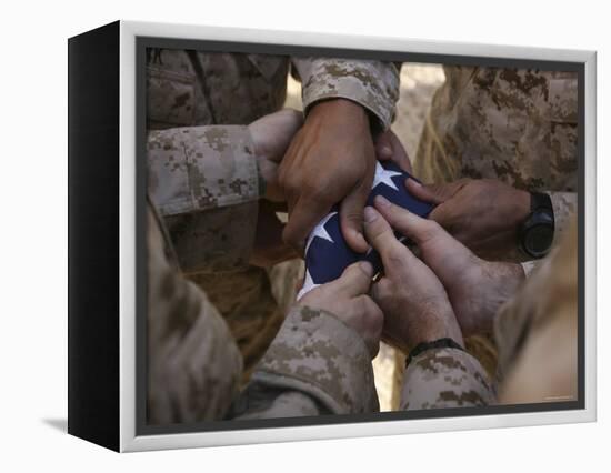 Marines Fold an American Flag after It was Raised in Memory of a Fallen Soldier-Stocktrek Images-Framed Premier Image Canvas