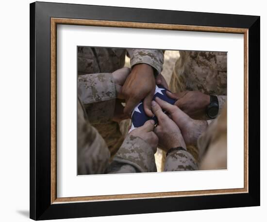 Marines Fold an American Flag after It was Raised in Memory of a Fallen Soldier-Stocktrek Images-Framed Photographic Print