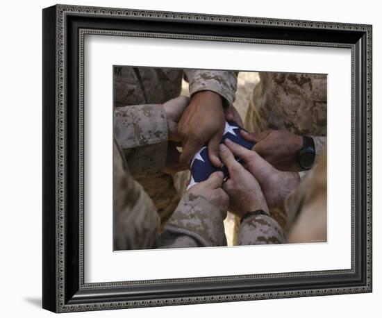 Marines Fold an American Flag after It was Raised in Memory of a Fallen Soldier-Stocktrek Images-Framed Photographic Print