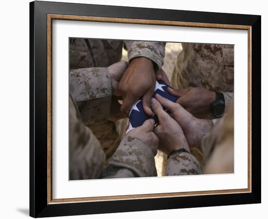 Marines Fold an American Flag after It was Raised in Memory of a Fallen Soldier-Stocktrek Images-Framed Photographic Print