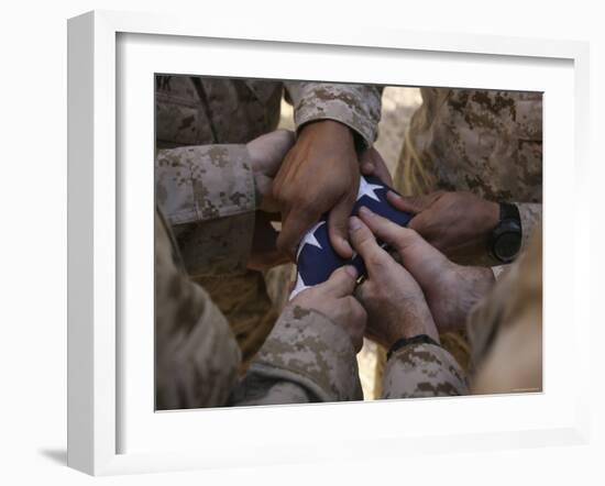 Marines Fold an American Flag after It was Raised in Memory of a Fallen Soldier-Stocktrek Images-Framed Photographic Print