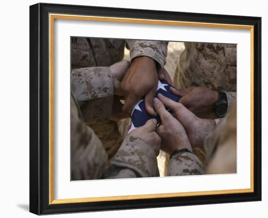 Marines Fold an American Flag after It was Raised in Memory of a Fallen Soldier-Stocktrek Images-Framed Photographic Print