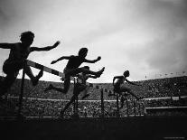 Action During the Women's 100m Hurdles at the 1952 Olympic Games in Helsinki-Mark Kauffman-Photographic Print