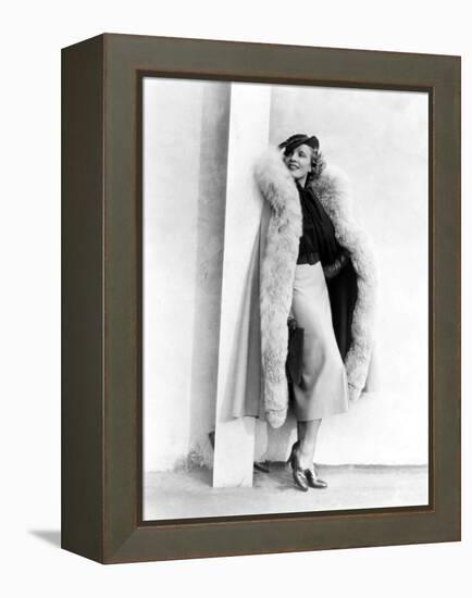 Marlene Dietrich, in a Brown and Beige Suit and Lynx-Trimmed Beige Wool Cape by Travis Banton, 1935-null-Framed Stretched Canvas