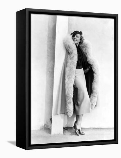 Marlene Dietrich, in a Brown and Beige Suit and Lynx-Trimmed Beige Wool Cape by Travis Banton, 1935-null-Framed Stretched Canvas