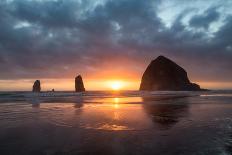 Haystack Rock reflected on the shoreline at Cannon Beach on the Pacific Northwest coast, Oregon, Un-Martin Child-Photographic Print