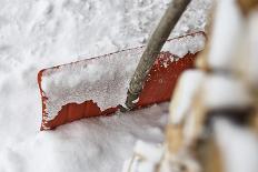 Snow shovel, snow, wood pile, detail, medium close-up, blur-Martin Ley-Framed Photographic Print
