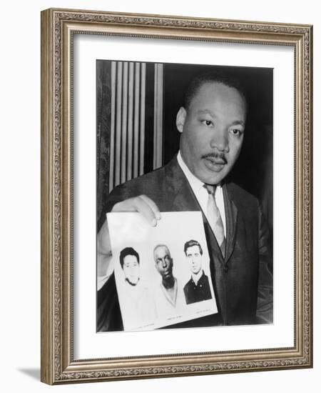 Martin Luther King Holding Photographs of Three Murdered Civil Rights Workers, 1964-null-Framed Photo