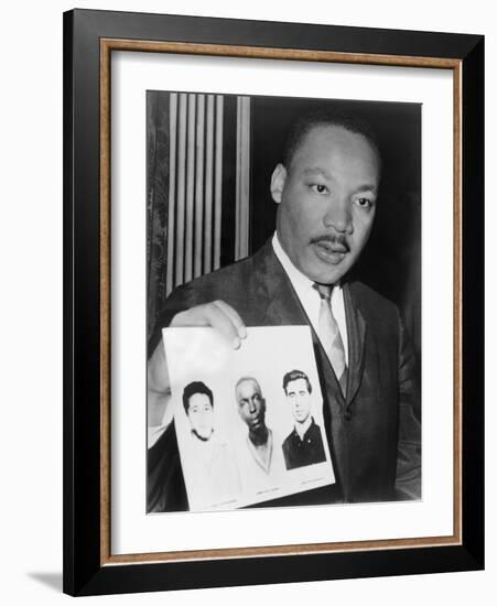 Martin Luther King Holding Photographs of Three Murdered Civil Rights Workers, 1964-null-Framed Photo