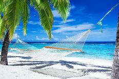 Empty Hammock between Palm Trees on Tropical Beach-Martin Valigursky-Photographic Print