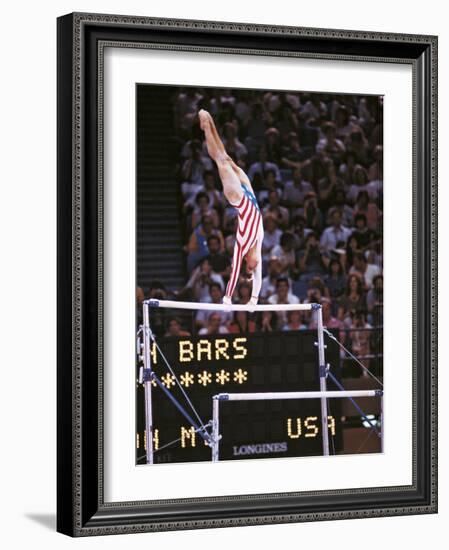 Mary Lou Retton on the Uneven Bars at the Los Angeles Olympic Games-null-Framed Photographic Print