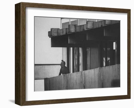 Masked Black September Arab Terrorist Looking from Balcony of Athletes Housing Complex-Co Rentmeester-Framed Photographic Print