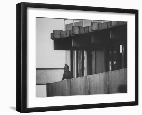 Masked Black September Arab Terrorist Looking from Balcony of Athletes Housing Complex-Co Rentmeester-Framed Photographic Print