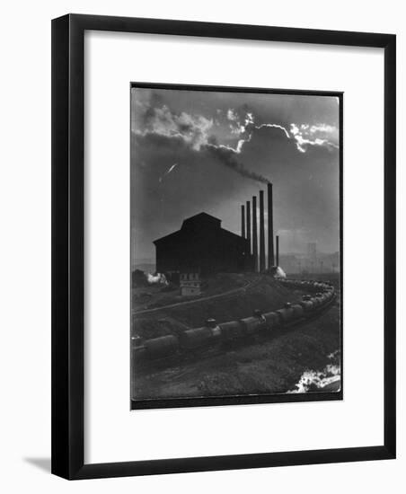 Massive Otis Steel Mill Surrounded by Tanker Cars on Railroad Track on a Cloudy Day-Margaret Bourke-White-Framed Premium Photographic Print