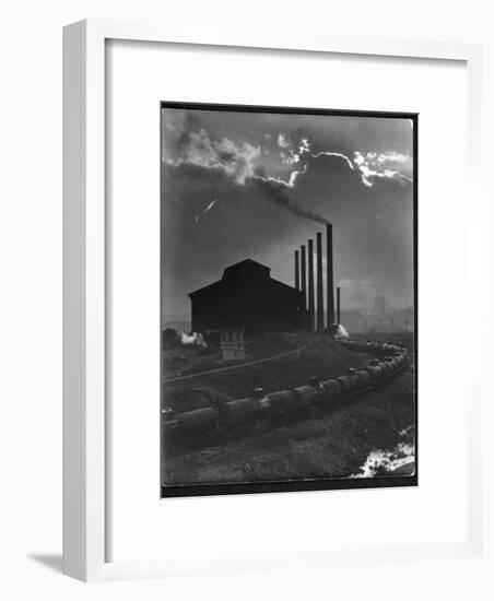 Massive Otis Steel Mill Surrounded by Tanker Cars on Railroad Track on a Cloudy Day-Margaret Bourke-White-Framed Premium Photographic Print