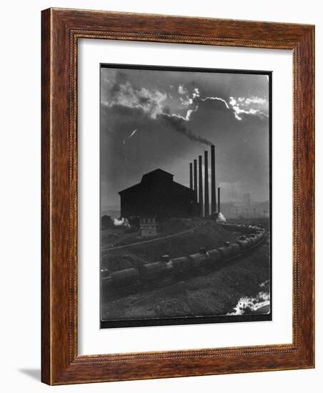 Massive Otis Steel Mill Surrounded by Tanker Cars on Railroad Track on a Cloudy Day-Margaret Bourke-White-Framed Photographic Print