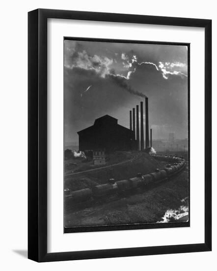 Massive Otis Steel Mill Surrounded by Tanker Cars on Railroad Track on a Cloudy Day-Margaret Bourke-White-Framed Photographic Print