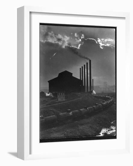 Massive Otis Steel Mill Surrounded by Tanker Cars on Railroad Track on a Cloudy Day-Margaret Bourke-White-Framed Photographic Print