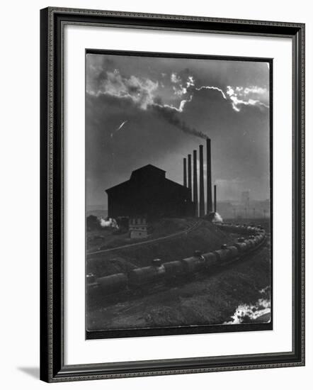 Massive Otis Steel Mill Surrounded by Tanker Cars on Railroad Track on a Cloudy Day-Margaret Bourke-White-Framed Photographic Print