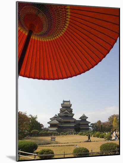 Matsumoto Castle Under Red Parasol, Nagano Prefecture, Kyoto, Japan-Christian Kober-Mounted Photographic Print