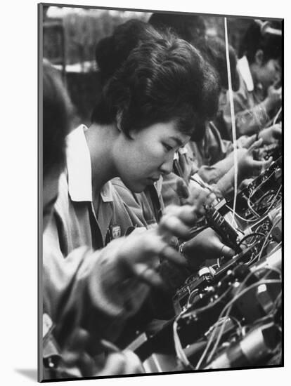 Matsushita Electronics Corp. Women Employees Working in a Factory-Bill Ray-Mounted Photographic Print