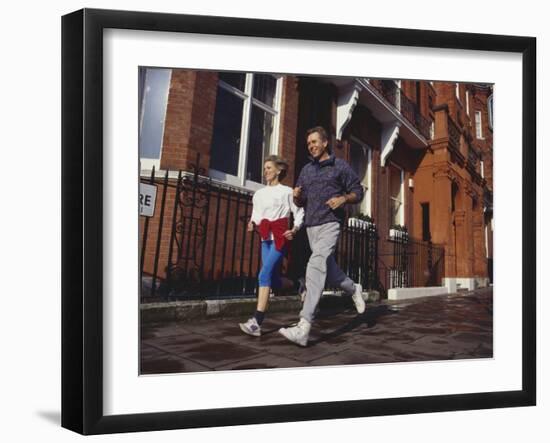 Mature Couple Out on a Fitness Run-Chris Cole-Framed Photographic Print