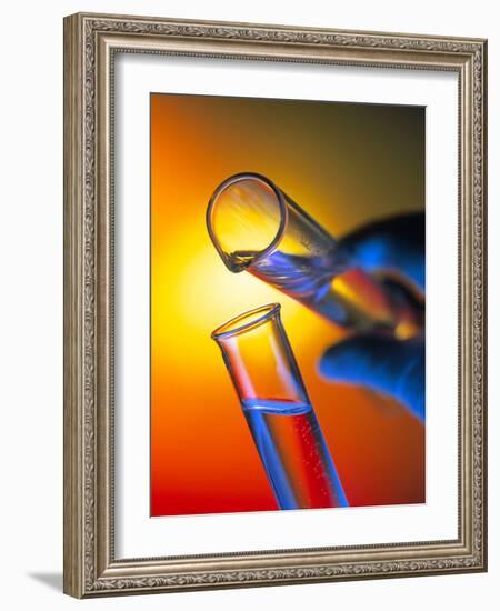 Measuring Cylinder Pouring Fluid Into a Test Tube-Tek Image-Framed Photographic Print