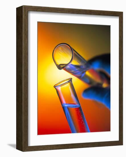 Measuring Cylinder Pouring Fluid Into a Test Tube-Tek Image-Framed Photographic Print