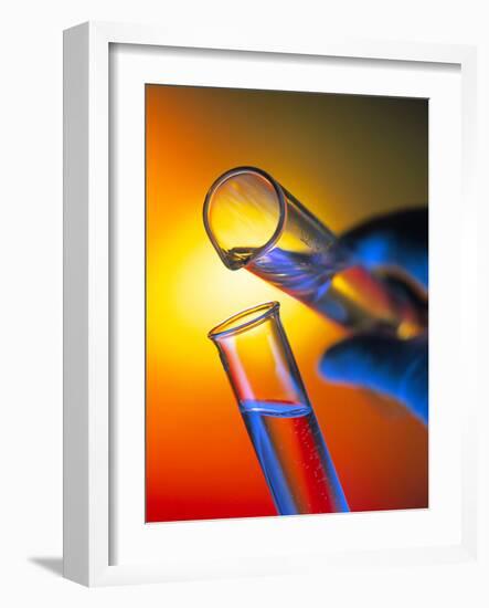 Measuring Cylinder Pouring Fluid Into a Test Tube-Tek Image-Framed Photographic Print