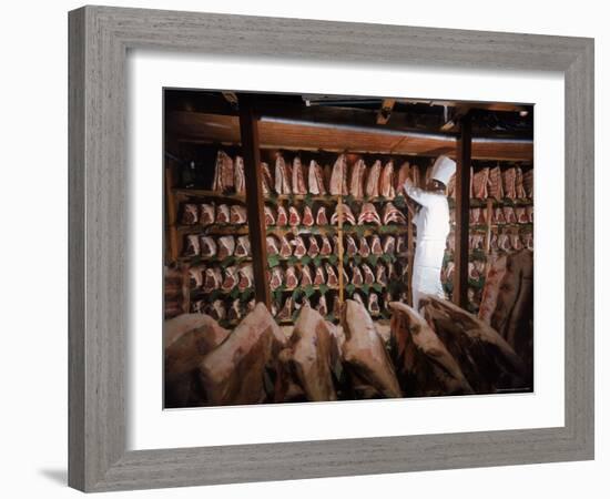 Meat Industry in the USA, Rib Roasts on Shelves and Butcher Making a Selection or Choice-Ralph Crane-Framed Photographic Print