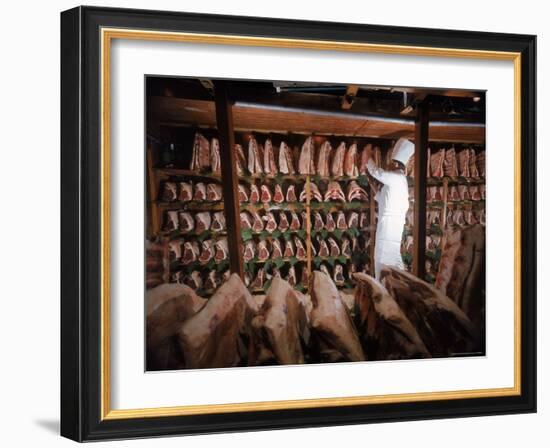 Meat Industry in the USA, Rib Roasts on Shelves and Butcher Making a Selection or Choice-Ralph Crane-Framed Photographic Print