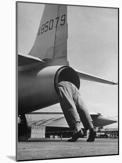 Mechanic Climbing Into Tailpipe to Check Clearance Between Turbine Wheel Bucket Tips and rug-Charles E^ Steinheimer-Mounted Photographic Print