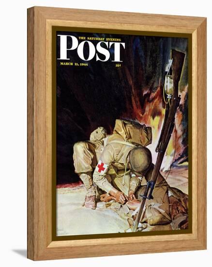 "Medic Treating Injured in Field," Saturday Evening Post Cover, March 11, 1944-Mead Schaeffer-Framed Premier Image Canvas