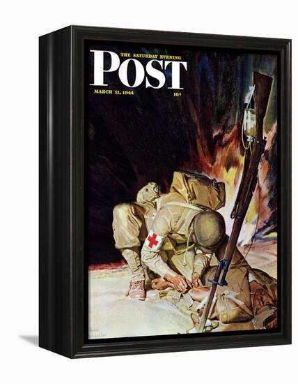 "Medic Treating Injured in Field," Saturday Evening Post Cover, March 11, 1944-Mead Schaeffer-Framed Premier Image Canvas