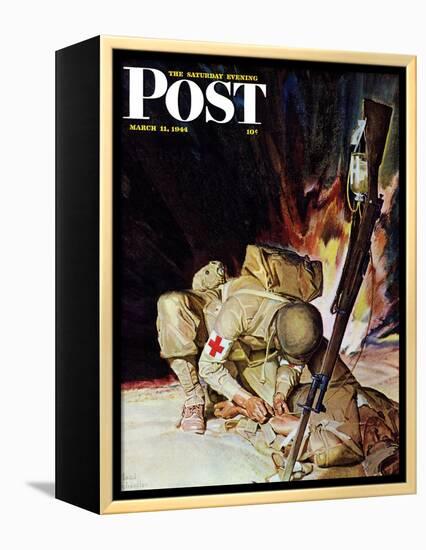 "Medic Treating Injured in Field," Saturday Evening Post Cover, March 11, 1944-Mead Schaeffer-Framed Premier Image Canvas