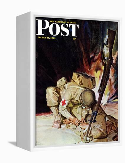 "Medic Treating Injured in Field," Saturday Evening Post Cover, March 11, 1944-Mead Schaeffer-Framed Premier Image Canvas