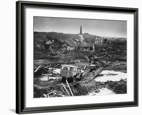 Medics' Ambulance Truck Driving Through Wreckage Left Behind at Battle Site During WWII-null-Framed Photographic Print