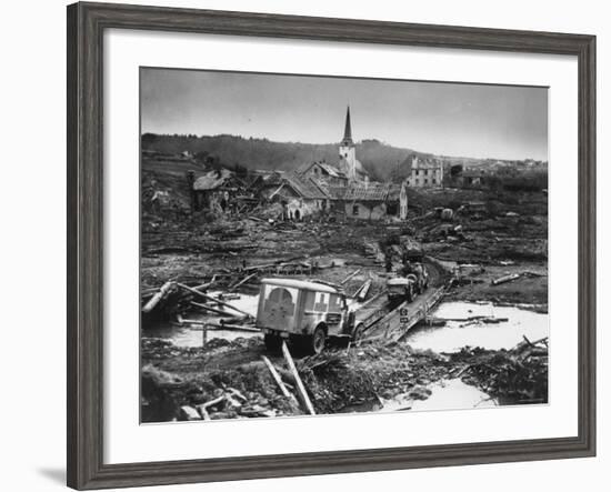 Medics' Ambulance Truck Driving Through Wreckage Left Behind at Battle Site During WWII-null-Framed Photographic Print