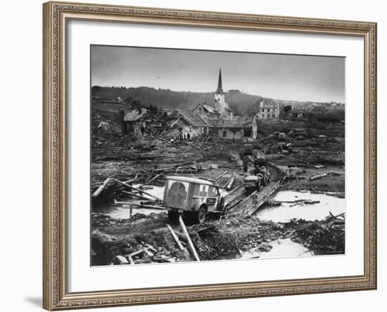 Medics' Ambulance Truck Driving Through Wreckage Left Behind at Battle Site During WWII-null-Framed Photographic Print