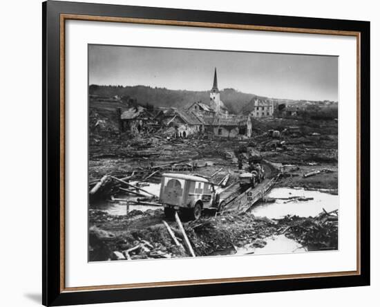 Medics' Ambulance Truck Driving Through Wreckage Left Behind at Battle Site During WWII-null-Framed Photographic Print