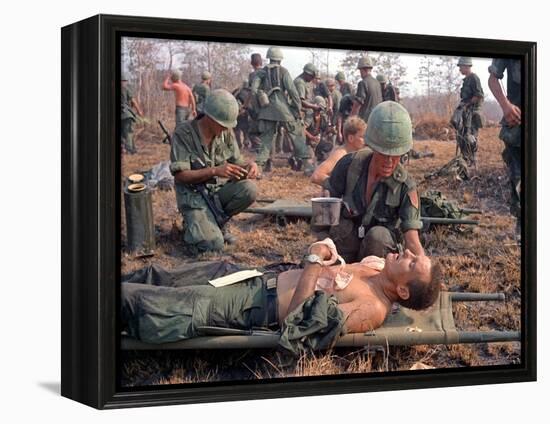 Medics Treat Wounded-Associated Press-Framed Premier Image Canvas