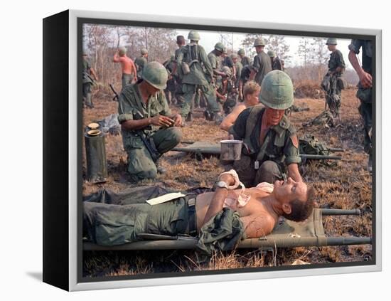 Medics Treat Wounded-Associated Press-Framed Premier Image Canvas