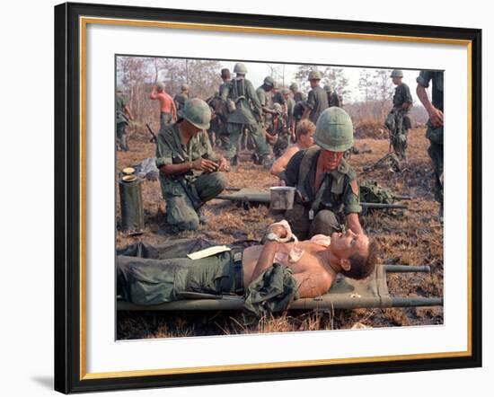 Medics Treat Wounded-Associated Press-Framed Photographic Print