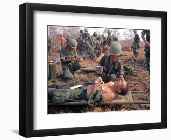 Medics Treat Wounded-Associated Press-Framed Photographic Print