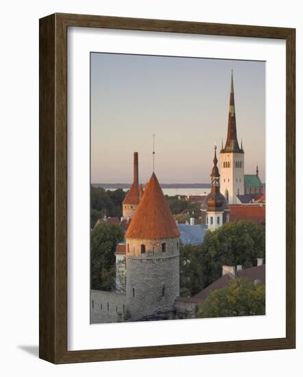 Medieval Town Walls and Spire of St. Olav's Church at Dusk, Tallinn, Estonia, Baltic States-Neale Clarke-Framed Photographic Print