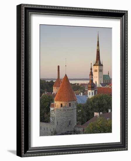 Medieval Town Walls and Spire of St. Olav's Church at Dusk, Tallinn, Estonia, Baltic States-Neale Clarke-Framed Photographic Print