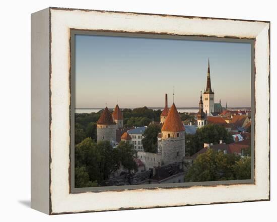 Medieval Town Walls and Spire of St. Olavs Church at Dusk, Tallinn, Estonia, Baltic States, Europe-Neale Clarke-Framed Premier Image Canvas